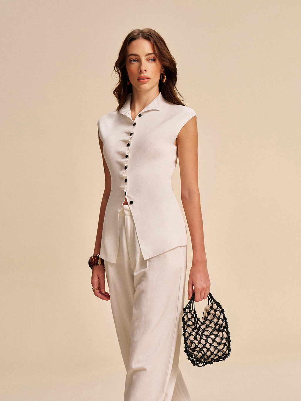 Düğmeli Ön Kolsuz Hırka