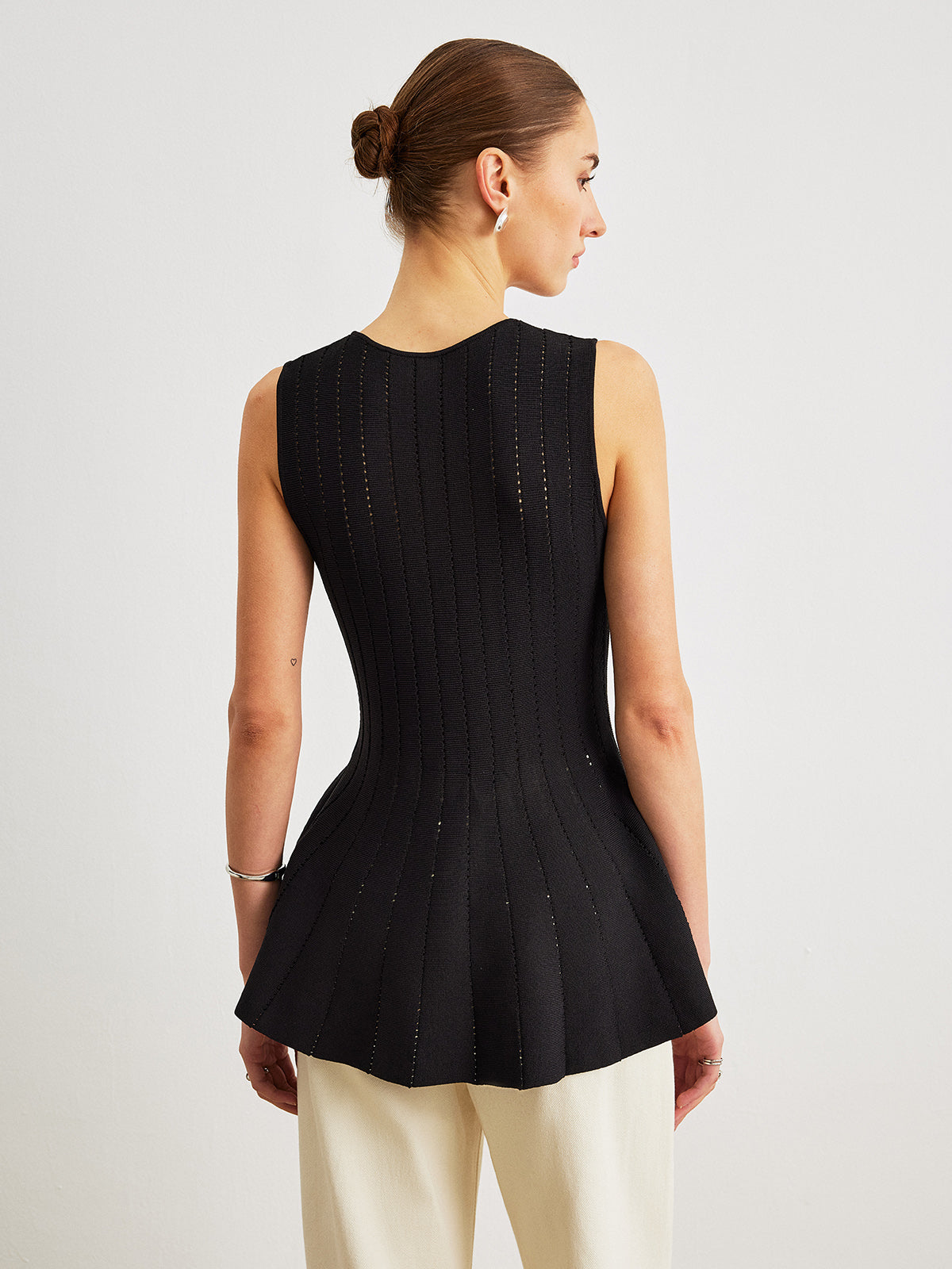 Fiyonk Detaylı Yarı Şeffaf Örgü Peplum Üst