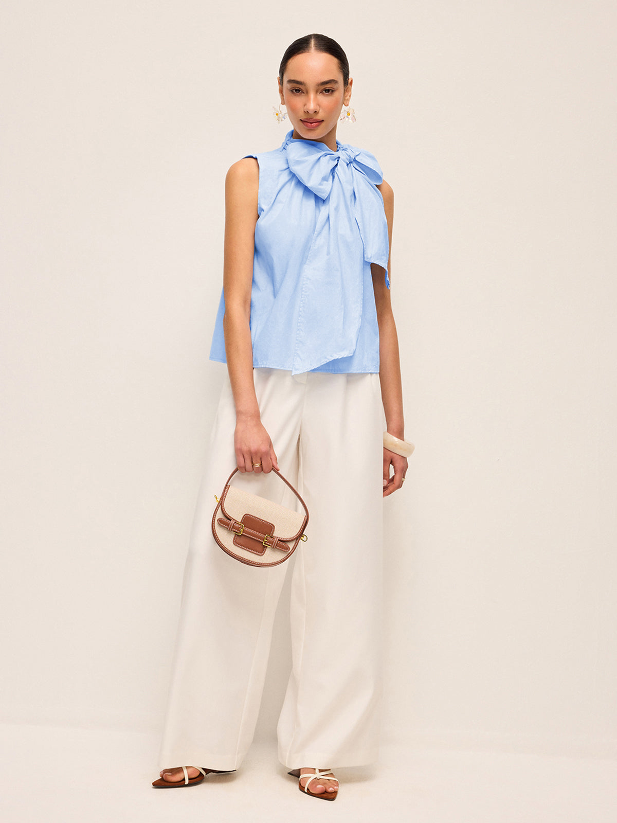 Büyük Boy Fiyonk Yaka Kolsuz Üst